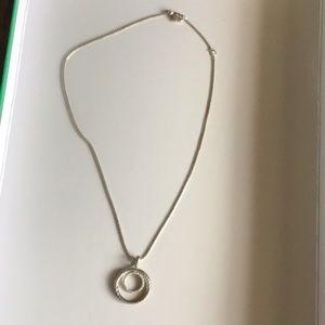 Woman’s David Yurman necklace with diamonds
